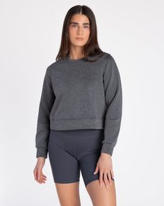 Introducing our Crew Neck Soft Scuba Sweatshirt: a sleek blend of style and comfort designed for your everyday adventures. Crafted from our signature Soft Scuba fabric, this sweatshirt offers a cozy yet breathable feel, perfect for layering over your gym gear or pairing with casual wear for effortless athleisure style. Featuring a classic crew neck design, this piece is tailored with a relaxed fit that flatters every figure, ensuring both comfort and versatility. Its durable, flexible material a Effortless Athleisure, Scuba Sweatshirt, Athleisure Style, Scuba Fabric, Everyday Adventures, Gym Gear, Comfort Design, Athleisure Fashion, Layered Tops