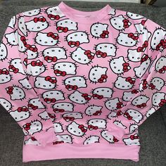 Brand New With Tags Adorable Pink Hello Kitty Pull Over Sweatshirt Kitty Head Aop 100% Polyester S-Xl Available Same/Next Day Shipping Long Sleeve Cotton Tops With Cat Print, Hello Kitty Crew Neck Fun Tops, Hello Kitty Fun Crew Neck Top, Kawaii Hello Kitty Print Crew Neck Top, Trendy Pink Top With Cat Print, Trendy Pink Tops With Cat Print, Casual Long Sleeve Top With Cat Print, Cute Cotton Sweatshirt With Hello Kitty Print, Cute Long Sleeve Sweatshirt With Cat Print