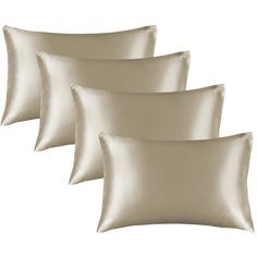 four pillows with satin piping on the sides and one pillow in beige, set of three