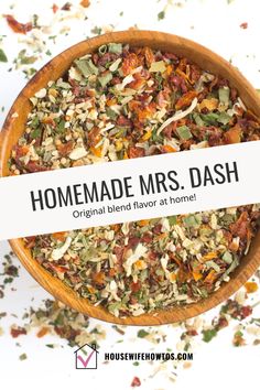 a wooden bowl filled with dried herbs and the words homemade mrs dash written on it