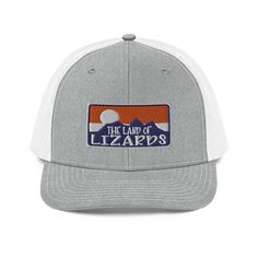 Complete your outfit with an embroidered trucker cap — It has a classic structured fit, adjustable plastic snapback, and a curved visor that matches its underbill.• 60% cotton, 40% polyester• 100% polyester mesh back• Structured, 6-panel, mid-profile cap• Pre-curved contrast stitched visor• Underbill matches visor color• Adjustable plastic snapback PLEASE NOTE: This cap is made to order * Due to the manufacturing process, once the order is placed no changes can be made * All caps are made on dem Gray Trucker Hat With Embroidered Logo, Gray Trucker Hat With Logo Patch And Curved Bill, Trucker Hat With Logo Patch And Curved Visor, Lizards, Snapback Cap, Manufacturing Process, Contrast Stitch, Black Charcoal, Trucker Cap