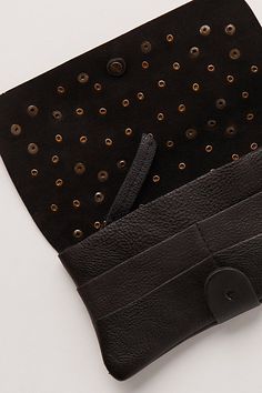 Designed to add a little something extra to a forever classic style, this so cool wallet is featured in a staple fold-over silhouette and luxe leather fabrication with defined stud detailing throughout and ample interior pockets for holding anything from credit cards to cash and everything in between. | Studded Pulito Wallet Bag by FP Collection at Free People in Black Chic Leather Clutch With Interior Card Slots, Chic Leather Bifold Wallet, Chic Leather Wallets With Card Slots, Chic Textured Leather Wallet For Everyday, Chic Leather Clutch With Card Slots, Black Leather Clutch With Snap Closure, Leather Wallet With Magnetic Closure, Chic Clutch Wallet With Snap Closure, Chic Bifold Wallet With Snap Closure