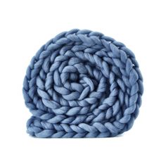 a blue chunky blanket on a white background