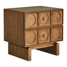 a wooden cabinet with four drawers on one side and three circles on the other end