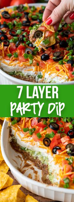 this is an image of a layered party dip with tortilla chips and black olives