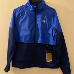 *100% AUTHENTIC* *BRAND NEW* *SOLD OUT IN STORES* Brand: The North Face Color: TNF Blue/Flag Blue Condition: New with Tags RETAIL PRICE $120.00 Measurements Armpit to Armpit 22" Waist 21" Hips 22" Hem Width 22" Length from Shoulder to Hem 25.5" Features - Standard Fit - Stretch Knit Fabric - Brushed Fleece Lining - Stretch Cuffs with Thumb Hole - Collared - DWR Durable Water Repellent Finish - Lightweight - Front Zipper Closure with Interior Draft Flap - 2 Exterior Zip Pockets - 2 Interior Slip Water Repellent Jacket, Blue Flag, Warm Winter, Front Zipper, Repellent, Nike Jacket, Water Repellent, Vest Jacket, North Face