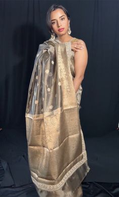 Bringing you the finest collection of Banarasi Tissue Silk Sarees with designer gotta Patti detailing. A Yet another stylish , elegant and timeless piece from our master weavers in Banaras. A Simple yet chic look which takes you from power brunch to date night. Adorn this effortless tissue silk saree in gold zari with designer gotta Patti details. Just gorgeous to the core and timeless . Luxurious fabric with softness and sheen just remarkable. Photos don't do justice .. this saree is just... gl Elegant Traditional Wear With Gota Work For Festivals, Elegant Traditional Wear With Gota Work For Designer Wear, Elegant Traditional Wear With Gota Work, Elegant Traditional Wear With Gota Work For Diwali, Transitional Katan Silk Pre-draped Saree For Wedding, Elegant Cotton Silk Pre-draped Saree With Dupatta, Wedding Tissue Silk Pre-draped Saree With Self Design, Banarasi Silk Pre-draped Saree For Celebration, Formal Katan Silk Pre-draped Saree