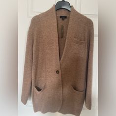 J Crew One-Button Sweater Blazer/Cardigan. Brown/Camel Color, Size Xs. New With Tags. Hits Upper/Mid-Thigh. 44% Acrylic 24% Merino Wool 17% Polyamide 12% Alpaca 3% Elastane Dry Clean Beige Cardigan For Business Casual In Fall, Brown Single Breasted Cardigan For Work, Brown Single-breasted Cardigan For Work, Fall Business Casual Beige Cardigan, Brown Workwear Cardigan With Pockets, Brown Cardigan With Pockets For Work, Brown Cardigan For Business Casual In Winter, Winter Brown Cardigan For Business Casual, Cozy Brown Cardigan For Workwear