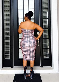 This fun, colorful fitted dress hugs every single curve in the right places sis. Adorned with a houndstooth print and colors of pinks and blue, the look is effortless. Simple, yet elegant at the same time. This fitted piece is waiting for you sis. S (6-8), M (8-10), L (10-12), 1X (14-16), 2X (16-18), 3X (18-22) Stretch dress Strapless Midi dress Bodycon Fit 89% Polyester 11% Spandex Hand wash cold Model is wearing 2X, 5'9" height. True to size but if you like a less fitted look, size up. 9.13.24 Plaid Mini Dress With Houndstooth Pattern For Party, Sleeveless Plaid Dress For Party, Fitted Houndstooth Dress For Party, Fitted Houndstooth Party Dress, Plaid Fitted Knee-length Midi Dress, Fitted Sleeveless Plaid Party Dress, Fitted Pink Plaid Dress For Spring, Knee-length Plaid Mini Dress For Party, Fitted Houndstooth Dress For Night Out