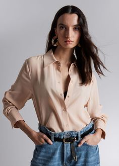 Mulberry silk shirt designed with a classic turn-down collar, long sleeves and a buttoned front.• Loose fit• Curved hemline• Pleated, buttoned cuffsLength of shirt:  66cm / 26" (EU 36 / UK 8 / US 4) Feminine Button-up Blouse With Button Cuffs, Chic Fall Shirt With Collared Neckline, Chic Business Casual Blouse With Lapel Collar, Chic Semi-formal Blouse With Lapel Collar, Business Casual Blouse With Spread Collar And Hidden Buttons, Business Casual Blouse With Spread Collar, Chic Collared Business Casual Shirt, Chic Button-up Shirt For Office, Business Casual Blouse With Hidden Button Closure