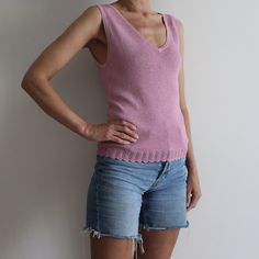 Pink Lurex Top Knitted Top V-Neck Sleeveless Top Knit Blouse Sweater Tank Top 1990s 00s Y2K Sparkle Top Medium Size Label size: M Fit size: Small to medium Model is 5.77 ft (176 cm) tall, she normally wears size S/M Measurements (lying flat): Pit to pit(without stretching): 15 3/4"/ 40 cm Waist: 14'' / 35.5 cm Length: 22"/ 56 cm Length from pit: 13.5'' / 34.5cm Condition: Great Vintage Condition Material: 30% lurex, 70% viscose Please check measurements to insure a proper fit. Remember to allow Vintage Stretch V-neck Top, Pink Fitted V-neck Sweater Vest, Vintage V-neck Tank Top For Spring, Spring Vintage V-neck Tank Top, Fitted Sleeveless Pink Sweater Vest, Fitted Pink Sweater Vest For Summer, Pink Stretch Sleeveless Sweater Vest, Pink V-neck Sweater Vest For Summer, Vintage V-neck Sweater Vest For Spring