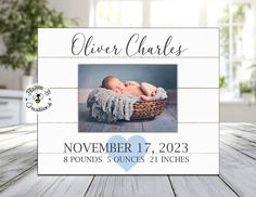 a baby is laying in a basket on a table with the words, silver charless