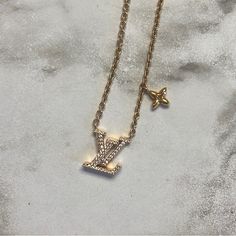 This Gold Louis Vuitton Necklace Is In Great Condition. It Is Pretty New And Has No Scratches Or Missing Jewels. If You Are Interested Or Would Like More Information, Please Reach Out! See Website For More Specifics. Willing To Negotiate. Lv Necklace Jewelry, Jewelry Louis Vuitton, Louis Vuitton Necklace Gold, Lv Necklace, Gold Louis Vuitton, Louis Vuitton Necklace, Louie Vuitton, Louis Vuitton Jewelry, Designer Necklace