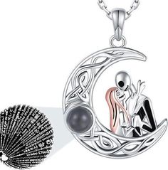 Description: Jack and Sally are sitting on the moon, and the moon gift necklace is inlaid with a 100 languages projector stone to show the sweet love between lover, also within friends and family. The cute Nightmare necklace also expresses the hope for happy and Leisure life. Keep a sweet mood, be a cute person. Material: The Jack and Sally necklace is made for S925 sterling silver. It is hypoallergenic, tarnish resistant, nickel-free, lead-free, cadmium-free, suitable for long-term wear - Return/Exchange Policies: *If your received item is not as described as the listing you can always return or exchange. If your order is damaged during transport, We kindly ask you to send a few picture of the damaged/broken item to us by message. *Please contact us before returning an item. *You will hav Black Themed Jewelry For Valentine's Day, Themed Black Jewelry For Valentine's Day, Sitting On The Moon, Moon Gifts, Christmas Gifts For Wife, Jack And Sally, On The Moon, Flower Heart, Love Is Sweet