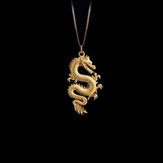 Introducing our captivating 14k Gold Dragon Pendant, a masterpiece of fantasy-inspired jewelry. This solid gold dragon necklace is a symbol of strength and mystique, meticulously crafted to showcase the intricate details of this mythical creature. Our Gold Dragon Pendant is a unique piece of artistry, handcrafted in 14 karat gold. PENDANT INFORMATIONThis pendant is made of real, solid gold.• Made in USA• Material: 14k or 18k solid gold• Finish: polished• Height: 1.46" (37 mm) | *includes the sma Gold Dragon Necklace, Zbrush Jewelry, Gold Necklace For Men, Jewelry Knowledge, Phoenix Pendant, Symbol Of Strength, Elegant Jewellery, Gold Dragon, Dragon Necklace