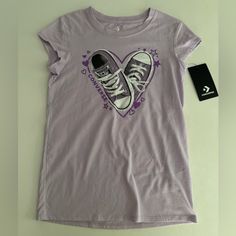 Brand New With Tags, Cute Light Purple Converse All Star T-Shirt. Cute Short Sleeve T-shirt With Star Print, Casual T-shirt With Star Print For Spring, Converse Graphic Print Short Sleeve T-shirt, Casual Short Sleeve Top With Star Print, Converse Cotton Graphic Tee, Converse Cotton Crew Neck Top, Converse Cotton Crew Neck T-shirt, Converse Graphic Tee In Cotton, Converse Graphic Tee Cotton Top