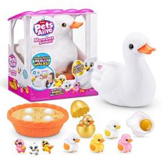 a white duck next to an assortment of toys