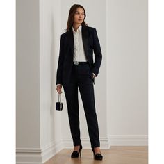 Waist darts and shoulder pads enhance the structured silhouette of this double-breasted blazer which features glossy satin peak lapels and a soft wool-blend twill construction. A must-have layer for holiday dressing this style is fiber-dyed with a festive plaid pattern realized in hues of blue green and black. Luxury Lapel Collar Semi-formal Pantsuit, Workwear Tuxedo With Hidden Button Closure And Suit Collar, Luxury Semi-formal Pantsuit With Lapel Collar, Double-breasted Tuxedo With Pressed Crease For Work, Elegant Tailored Double Breasted Suit For Fall, Tailored Outerwear With Structured Shoulders For Formal Events, Tailored Outerwear With Structured Shoulders For Formal Occasions, Sleek Formal Pantsuit With Lapel Collar, Sleek Pantsuit With Lapel Collar For Formal Occasions