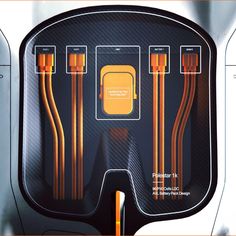 the inside of an electronic device with orange and yellow wires attached to each side of it