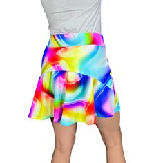 Step up your game in this fun neon rainbow poly orb print athletic golf skort with built in compression shorts and pockets.  This golf, tennis, running or sports skirt is flutter-style with a peplum in the back. It allows for plenty of movement and made of high quality performance spandex. The compression shorts are uniquely designed to be incredibly comfortable and won't ride up during activity. The 2 pockets are positioned on the sides of the shorts, and will fit your phone, keys, ID, etc.  *P Spring Multicolor Stretch Swim Skirt, Multicolor Skort For Spring, Casual Stretch Multicolor Skort, Casual Multicolor Swim Skirt For Spring, Casual Multicolor Tennis Skirt, Multicolor Skort With Built-in Shorts For Summer, Multicolor Stretch Mini Skort, Casual Multicolor Stretch Swim Skirt, Casual Fitted Multicolor Tennis Skirt