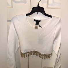 Sexy Hot Diamond Rhinestone Dazzling Crop Blouse Size Large Never Used Still Has Tags ! I Have Other Sizes Available Just Look Through My Closet :) Perfect For Pairing With A Skirt, Dress, Or Pants ! Fitted Tops With Rhinestone Fringe For Club, Glamorous Club Tops With Rhinestone Fringe, White Rhinestone Party Tops, Trendy Rhinestone Fringe Top For Night Out, Trendy Embellished Tops For Club, Embellished Long Sleeve Crop Top For Night Out, Trendy Rhinestone Tops For Club, White Top With Rhinestones For Night Out, Fitted Rhinestone Fringe Crop Top For Night Out