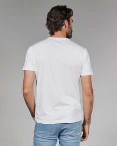 A reliable basic tee crafted from a softer-than-ever modal fabrication, offering the perfect amount of stretch and recovery. This essential piece keeps you cool and dry all throughout the day with its moisture wicking properties. Details Model is 6'2 wearing a size medium. Care: Turn inside out. Machine wash cold on delicate cycle with similar colors. Tumble dry on low. Iron on low if needed. Composition: 57% Cotton | 38% Modal | 5% Spandex White Jersey T-shirt For Summer, Classic White Stretch T-shirt, White Short Sleeve Jersey Top, Everyday White Stretch T-shirt, White Crew Neck Top With Minimal Stretch, Summer White Jersey T-shirt, White Relaxed Fit Jersey T-shirt, Casual White Tops With Minimal Stretch, Short Sleeve Flannel