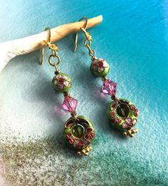 💜Genuine Vintage Cloisonne Earrings in apple green with pink flowers and pink Swarovski Bicone Crystals.  Gold vermeil butterfly ear wires in 24k made in Italy.   The delicate Cloisonne baubles are from my collected treasures of over 15 years.  One of a kind earrings, and only a limited number of these old Cloisonne left. Happy to set them free to be worn and loved! 💜 Nickel-free Green Round Flower Earrings, Whimsical Green Round Jewelry, Green Jeweled Round Earrings, Whimsical Green Jewelry, Handmade Green Flower Earrings, Green Flower Earrings For Pierced Ears, Dressy Earrings, Donuts Earrings, Gold Filigree Earrings