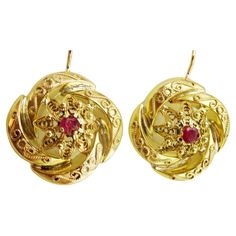 A pair of vintage handmade in acid tested 14 karat Gold Earrings set with a 2.5 mm Round Ruby. The design and workmanship on these earrings is top caliber. just over one inch long - 27 mm 3/4 of an inch wide - 2 cm Gold Earrings Set, Headpiece Jewelry, Vintage European, European Vintage, Earrings Set, Handmade Earrings, Headpiece, Earring Set, Jewelry Earrings Dangle