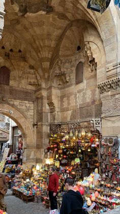 an outdoor market with lots of items for sale