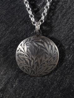 "The classic and timeless William Morris - inspired Willow pattern, acid-etched into a silver disc, 25mm or 1 inch diameter.  The disc is fabricated from 1mm sterling silver sheet and slightly domed to create a limited-edition pendant. Following the chemical etch, the image is slightly oxidised to add contrast to the image, before the entire piece is brushed to leave a matte-silver finish. If you would prefer a polished finish on this piece, please message me. To echo the disc shape, two rings c Mens Silver Bangle, William Morris Inspired, Custom Pendant, Willow Pattern, Personalized Pendant, Custom Pendants, Mens Silver Rings, Arts And Crafts Movement, Silver Gifts