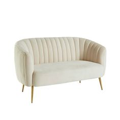 a white couch with gold legs on a white background