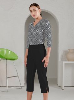 Solid Knit Capri pant 95000 Black Relaxed Fit Capris, Black Relaxed Fit Capri Pants, Versatile Black Capri-length Bottoms, Versatile Black Capri Bottoms, Chic Black Capri Length Bottoms, Chic Black Capri Length Pants, Chic Black Capri Pants, Casual Elastane Capri Pants, Elegant Stretch Capri Bottoms