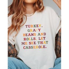 Turkey Gravy Beans And Rolls Let Me See That Casserole Shirt,Thanksgiving T-Shirt,Thanksgiving Dinner Shirt, Funny Thanksgiving Fall Shirt Thankful Grateful Blessed fall shirt, thankful shirt, grateful shirt, blessed shirt , fall t-shirts , women fall shirts ,Thanksgiving Shirt, Thanksgiving Gift, Christian Fall Shirt, Thanksgiving Gift Shirt, Fall shirt,Thankful Blessed Happy THANKSGIVING to all  This t-shirt is great for all things from Fall, Halloween  to Thanksgiving and all special events in it. Match this shirt with a cozy denim jacket or your favorite jeans and you're ready for  all funny Fall, Halloween Spooky season and Thanksgiving   activities. It will become your new favorite shirt and helps you keep your Thankful vibes. 👉HOW TO ORDER👈 1️⃣ Please review all the information pr White Tops With Funny Text For Fall, Thanksgiving Letter Print Cotton Tops, Thanksgiving Letter Print Crew Neck Top, Grateful Shirt, Christian Fall, Funny Thanksgiving Shirts, Blessed Shirt, Thankful Shirt, Screen Printing Shirts