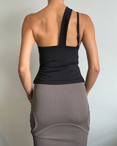 Two straps both go to one side. Adjustable shoulder strap on one side. Flared bottom to cinch waist. Mid weight fabric that hugs the body. 91% polyester 9% spandex. True to size, model is 32C, wearing S. Cinched Waist, The Body, Best Sellers, Onyx, Shoulder Strap, Spandex, Fabric, How To Wear