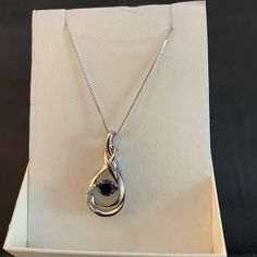 The Perfect Gift For The Special Lady With The Birthday In September Or Christmas Gift In Your Life. Sterling Silver Necklace Stamped 925 On Clasp Lab-Created White Blue Sapphire Floating Stone In Middle Of Tear Drop Frame Approx. Measurements 17” Orig. Price: $80.00 Blue Birthstone Necklace For Anniversary, Blue Sterling Silver Birthstone Necklace As Gift, Blue Sterling Silver Birthstone Necklace For Gifts, Blue Sapphire Birthstone Necklace For Anniversary, Silver Birthstone Necklace For Formal Occasions, Blue Pendant Birthstone Necklace For Anniversary, Blue Sterling Silver Jewelry For Birthday, Silver Sapphire Necklaces For Anniversary, Silver Sapphire Necklace For Anniversary