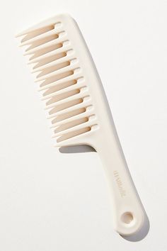 This essential detangling comb is gentle on your hair and scalp and glides easily through all hair types. Rounded wide teeth are designed to be gentle on your hair and scalp. Dr Bedroom, Detangling Comb, Stocking Ideas, 90s Teen, Hair Care Tools, Tiktok Account, Hair Care Products Professional, Professional Hairstylist, Styling Comb