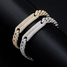 What's the point of having a killer outfit if your accessories don't match? 9mm Miami Cuban Chain Bracelets make sure that your whole look is on fleek. Whether you're going for a night out on the town or just seeking to add some extra flair to your everyday style, these bracelets add the right amount of luxury and edge. Made with high quality gold plating and adorned with dazzling cubic zirconia stones, they'll make you look and feel like a million bucks - without breaking the bank. So go ahead Iced Out Cuban Link Bracelets For Party, Iced Out Cuban Link Bracelet For Party, Iced Out Cuban Link Party Bracelet, Cuban Link Bling Bracelets For Party, Party Cuban Link Bling Bracelets, Cuban Chain Bracelet, Cuban Link Bracelet, Miami Cuban Link Chain, Mens Fashion Jewelry