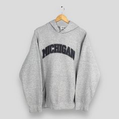 Vintage Michigan State Gray Hoodie Sweatshirt Large Michigan Spell Out Embroidery Pullover Michigan University Jumper Michigan Sweater  L Size On Tag :- Size L Manual Measurement :- WIDTH (armpit to armpit) :- 24" inches LENGTH (shoulder to end of garment) :- 27.5" inches WEIGH :- 0.52 kg Condition :- Good Condition. No holes and stains. - Colors Might Be Different Due To Lighting. - All items are VINTAGE which show some signs of wear and tear. FEDEX EXPRESS = 3-6 business day arrived Please pro Usa Sweater, Michigan University, Vintage Michigan, Michigan Usa, Gray Hoodie, Michigan State, Grey Hoodie, Gibson, Hoodie Sweatshirt