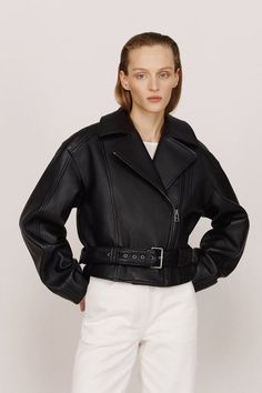 "KULAKOVSKY's black fitted biker jacket features a dropped shoulder line and is meticulously crafted from thick leather. The inclusion of an additional belt at the waist provides the flexibility to alter the silhouette, allowing you to achieve either a feminine cut or a more relaxed fit. Shop now at doors.nyc and #supportUKRAINE Fitted Biker Jacket, Black Biker Jacket, Independent Fashion Designers, Chilly Weather, Independent Designers Fashion, Black Fits, Fall Wardrobe, Biker Jacket, Doors