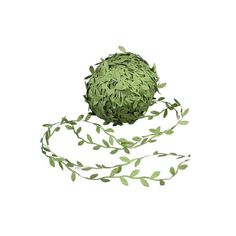 a ball of grass with green leaves on it