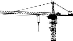 a crane is silhouetted against a white background in this black and white photo, it appears to be working on the construction site