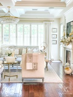 a living room filled with furniture and a fire place