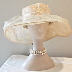 This Is A Beautiful Feminine Organza Hat Perfect For All Occasions! I Would Call This Beige, Cream, Or Peach. Elegant Embroidered Adjustable Hat, Adjustable Cloche Sun Hat For Wedding, Beige Flat Brim Sun Hat For Wedding, Lace Wedding Hat, Vintage Brimmed Sun Hat For Wedding, Spring Curved Brim Hat For Mother Of The Bride, Fitted Wide Brim Sun Hat For Wedding, Beige Curved Brim Sun Hat For Wedding, Adjustable Cream Sun Hat For Wedding