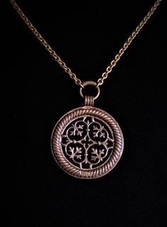 Vintage Kalevala Koru "Tuukkalan Riipus" pendant necklace, Finland. Kalevala Koru Oy established in 1937, Kalevala Koru Oy is the most beloved jewelry company in Finland and the biggest employer of goldsmiths and jewelry professionals nationwide. Kalevala jewelry is hand-made by more than 80 Kalevala Koru employees in the company's own workshop in Helsinki. The company is owned by the Kalevala Women's Association, which supports Finnish culture. The Kalevala Koru Cultural Foundation awards annua Brass Round Pendant Amulet Medallion Necklace, Brass Amulet Medallion Necklace With Round Pendant, Bronze Coin Pendant Necklace, Ceremonial Brass Jewelry With Coin Pendant, Brass Amulet Jewelry With Round Pendant, Bronze Round Amulet Necklace, Bronze Coin Pendant Medallion Necklace Gift, Bronze Medallion Necklace With Coin Pendant, Bronze Medallion Necklace With Coin Pendant As Gift