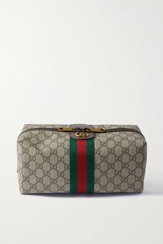 Gucci's cosmetics case doubles as a wash bag and is ideal for using in large totes to help you stay organized. Made from canvas-jacquard that's been coated for durability, it's surprisingly spacious, with room for your makeup or tech essentials like power packs and chargers. The two-way zip makes it easy to open up and find smaller items that have dropped to the bottom. Tech Essentials, Beauty Case, Gucci Leather, Brown Coat, Wash Bag, Gucci Accessories, Dark Brown Leather, Cosmetic Case, Stay Organized