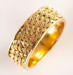 18k Yellow Gold Woven Style Wedding Anniversary Band Ring 5.22g 7.1mm WidthMetal Information: 18k Yellow GoldTotal Weight: 5.22gBand Width: 7.1mmSize: 6.25Estimated Retail Price: $1065.00OUR PRICE: $850.00SizingMany of our pieces can be re-sized at the buyers request. Please email us if you require our skilled professional services.44781 Heirloom Yellow Gold Jewelry With Thick Band, Heirloom Thick Band Yellow Gold Jewelry, Fine Jewelry Engraved Wide Band Wedding Ring, Yellow Gold Wide Band Fine Jewelry, Wide Band In Yellow Gold Fine Jewelry Style, Traditional Yellow Gold Jewelry With Decorative Band, Heirloom Yellow Gold Couple Rings For Formal Occasions, Heirloom Style Yellow Gold Couple Rings For Formal Occasions, Formal Heirloom Yellow Gold Couple Rings