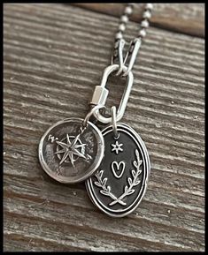 This compass charm is hand torched with.999 silver.  It is made from an impression from a wax seal stamp. Each one is unique and one of a kind. Wax Carved Ring, Stamp Necklace, Seal Jewelry, Wax Seal Jewelry, Stamped Necklaces, Compass Pendant, Compass Necklace, Wax Seal Stamp, Seal Stamp