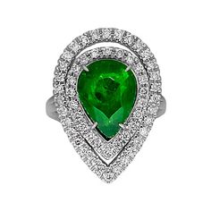 A Breathtakingly Striking  HANDMADE 14k White Gold Ring with Beautiful Pear Cut Tsavorite in Green color! The GEM is 5.24 CT and measures 13.22x9.73x5.34 mm! This Stone will take your breath away, especially on the sunlight! You will want to look at this stone endlessly. The mounting is a masterpiece! HANDMADE 14K White Gold Mounting (tested), that was is custom made to Accommodate this Beauty of a Gem in Prongs setting! Super FINE Workmanship on the Diamond prong  setting with 54 pcs Brilliant Full Cut Diamonds in GH color, SI1 clarity, totaling to approx 0.84 ct! Fabulous Braided Band and Diamond Gallery! The Entire Top's outline is 24.9x18.0 mm- HUGE. The Ring weights 8.5 g, nice and SOLID. Sits 6.7 mm off the top of the finger. Finger size 7 (Free Re-sizing with purchase). Center Stone Green Platinum Gemstones Fine Jewelry, Fine Green Platinum Gemstones Jewelry, Gia Certified Pear-shaped Diamond Emerald Ring, Luxury Green Gemstones With Halo Setting, Luxury Tsavorite Gemstones For Anniversary, Green Diamond Fine Jewelry Gemstones, Formal Pear-shaped Emerald Ring In White Gold, Green Diamond Emerald Ring, Pear-shaped, Green Diamond Emerald Ring Pear-shaped