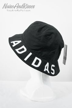 adidas official logo hat. 58cm Adjustable Black Bucket Hat With Letter Print, Black Bucket Hat With Letter Print, Casual Black Bucket Hat With Letter Print, Casual Adidas Logo Cap, Black Letter Print Bucket Hat, Black Bucket Hat With Letter Print And Curved Brim, Adidas Logo Snapback Hat For Sports Events, Adidas Logo Adjustable Snapback Hat, Adjustable Adidas Logo Snapback Hat