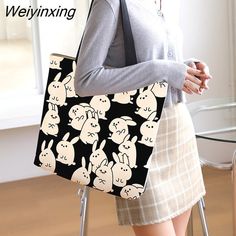 Shipping: Worldwide Express Shipping AvailableDelivery time: 🚚7-15Days Fast ShippingReturns: Fast refund,💯100% Money Back Guarantee.Origin: Mainland ChinaLining Material: PolyesterPlace Of Origin: ZHE JIANG ProvinceShape: Casual ToteMain Material: CanvasStyle: CasualClosure Type: zipperOccasion: VersatilePattern Type: CartoonInterior: Cell Phone PocketGender: WOMENDecoration: NONEExterior: NONEHardness: SOFT Rectangular Bags With Cartoon Print For Daily Use, Trendy Travel Bag With Cartoon Print, Trendy Cartoon Print Bags For Daily Use, Trendy Bags With Cartoon Print For Daily Use, Trendy White Bag With Cartoon Print, Black Casual Reusable Bag, Casual Black Reusable Bag, Canvas Shopping Bag, Shopping Bags